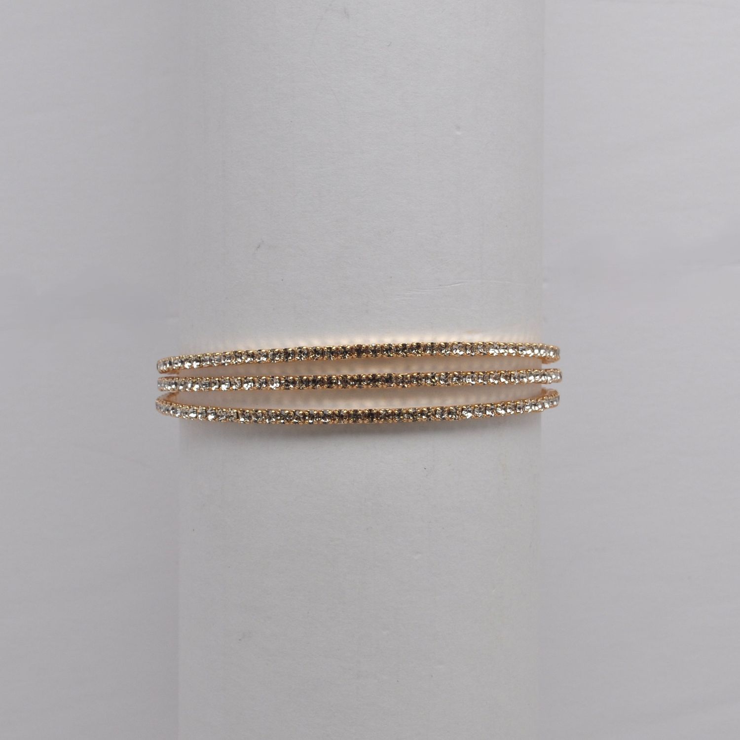 J83450B1G CLR/G 3 ROW CRY BRAC