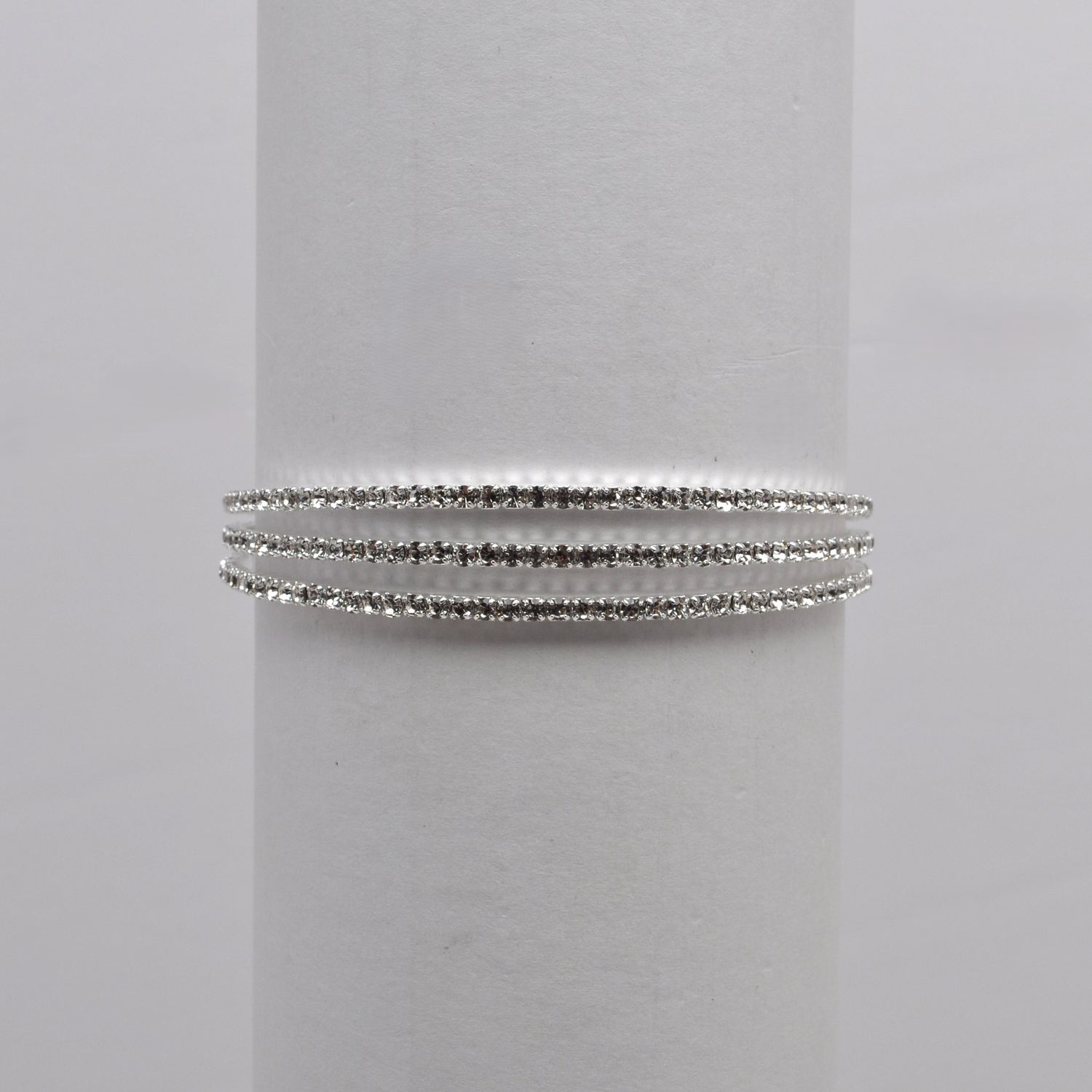 J83450B1S CLR/S 3 ROW CRY BRAC