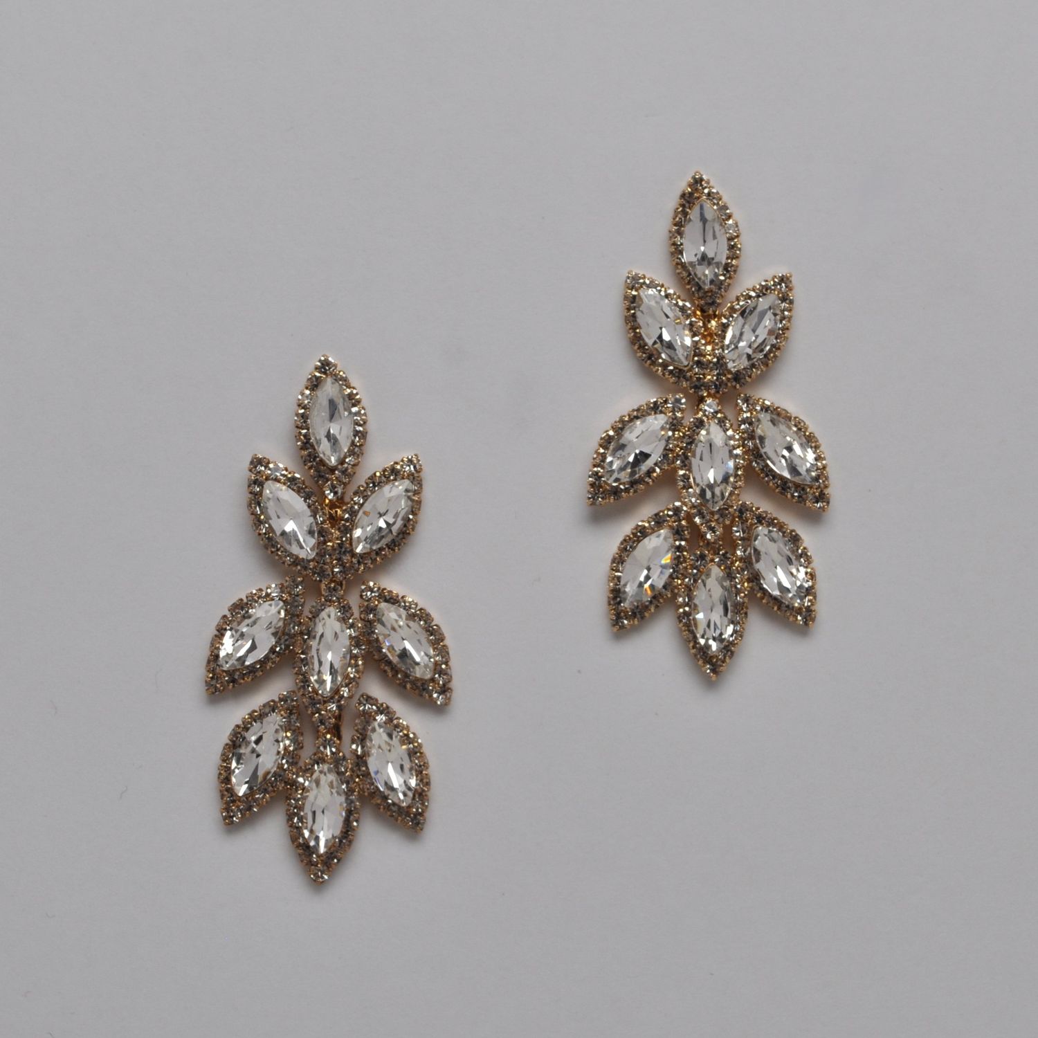 J44011E1G CLR/G MRQUS STN LEAVS EAR