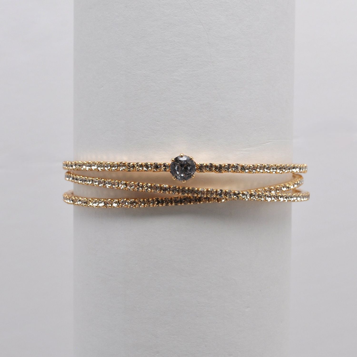 CC0066B1G  CRY/G 3 ROW  W' CNTR STONE WRAP BRC