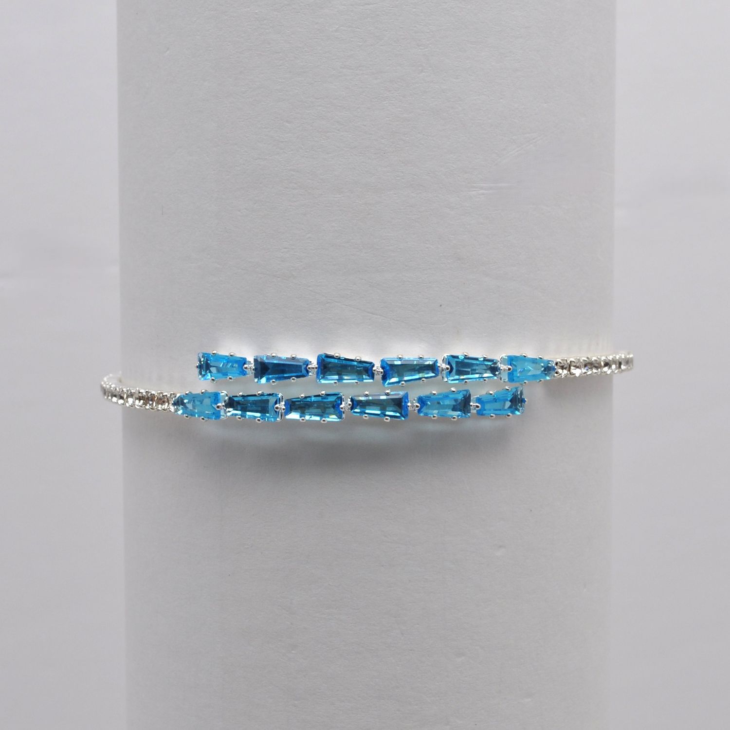 CC0067B13S1 CZ/AQUA/S 1 ROW BAGETTE STONE WRAP BRC