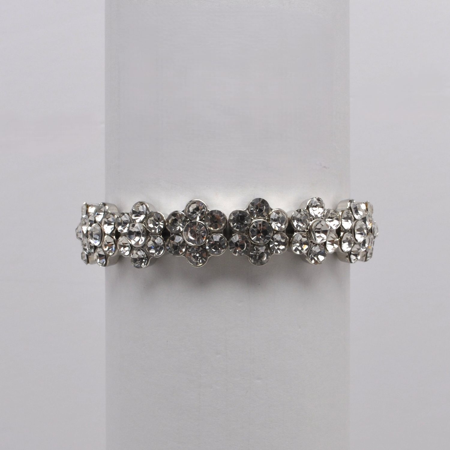 QQ1861B1S  CLEAR /S  SM ROUND FLWR DESIGN BRCLT