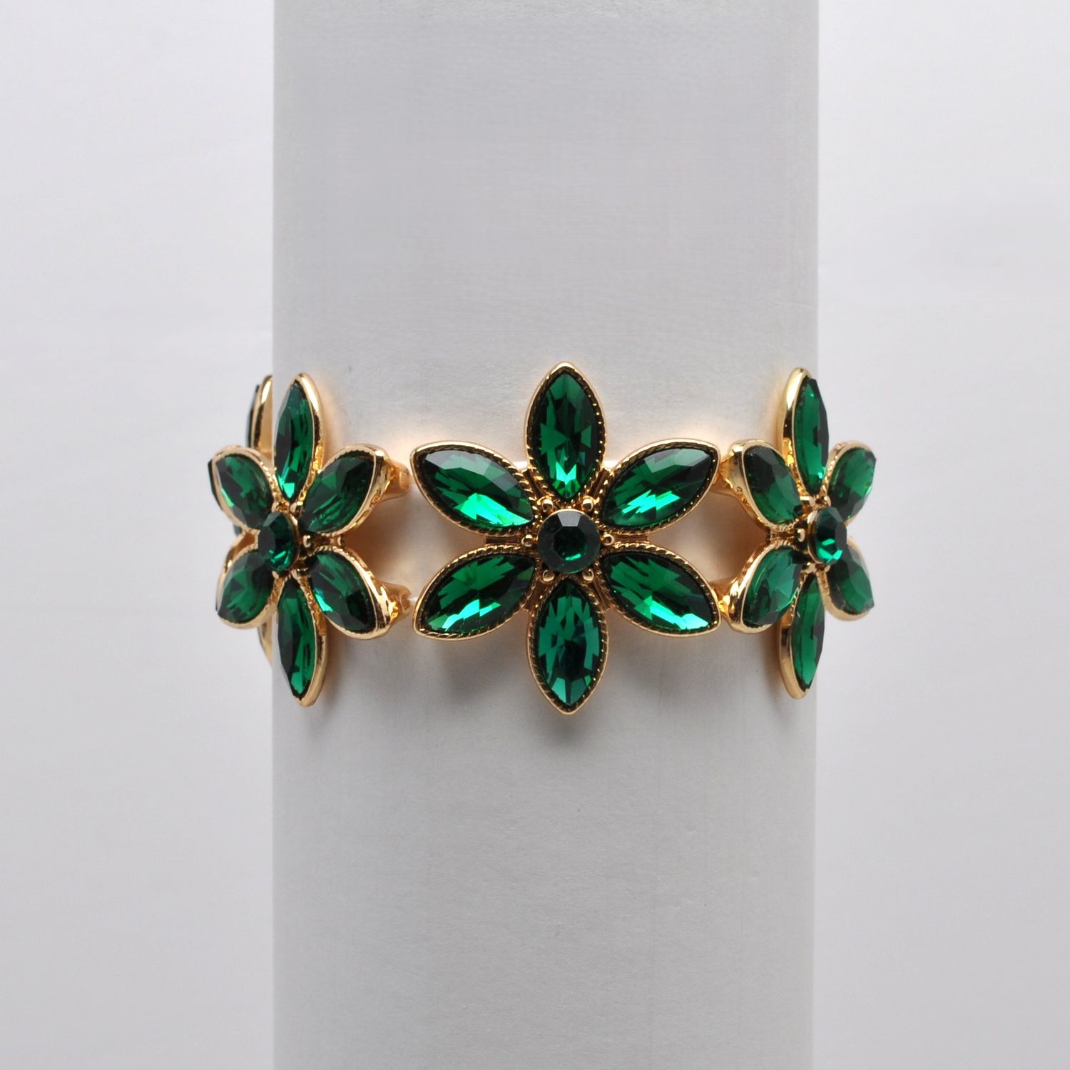 QQ2104B18G  EMERLD/G  FLWR DESIGN MARQUISE STNS BRCLT