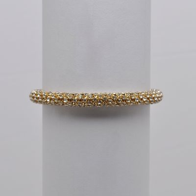 J84565B1G CLR/G  GOLD 7MM STRETCH TUBE BRAC