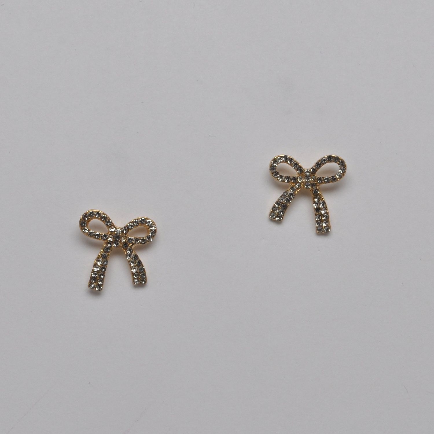 J28020E1G CRYS/GLD BOW POST  EAR