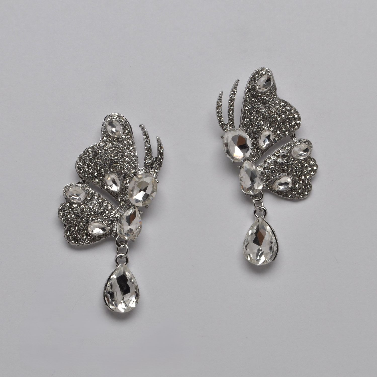 SI2513E1S  CRYS/S  BUTTERFLY W' BTTM TRDRP DNGL EAR