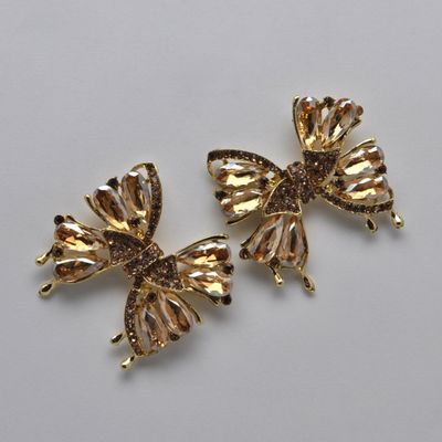 SI2520E4G LT-LT-COL/GLD  BOW STYLE STN DNGLE EAR