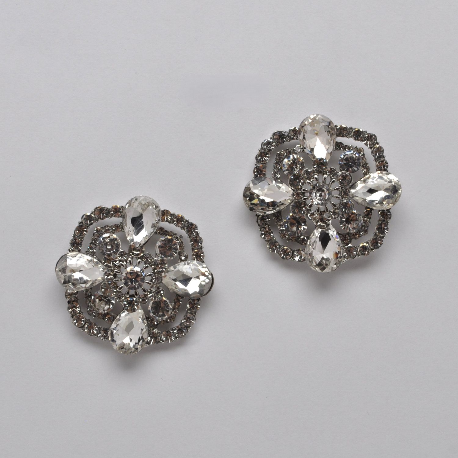 SI2521E1S CLR/S BUTTON SHAPE FLRW POST EAR