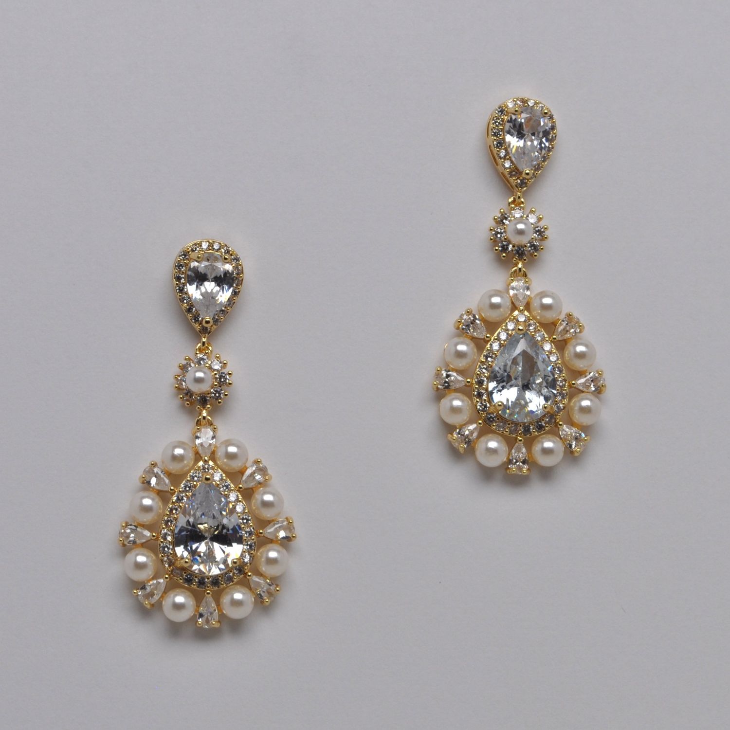 HJ001E40G CZ/PRL/G CLSTR TRDRP DNGLE CENTER MARQUISE EAR