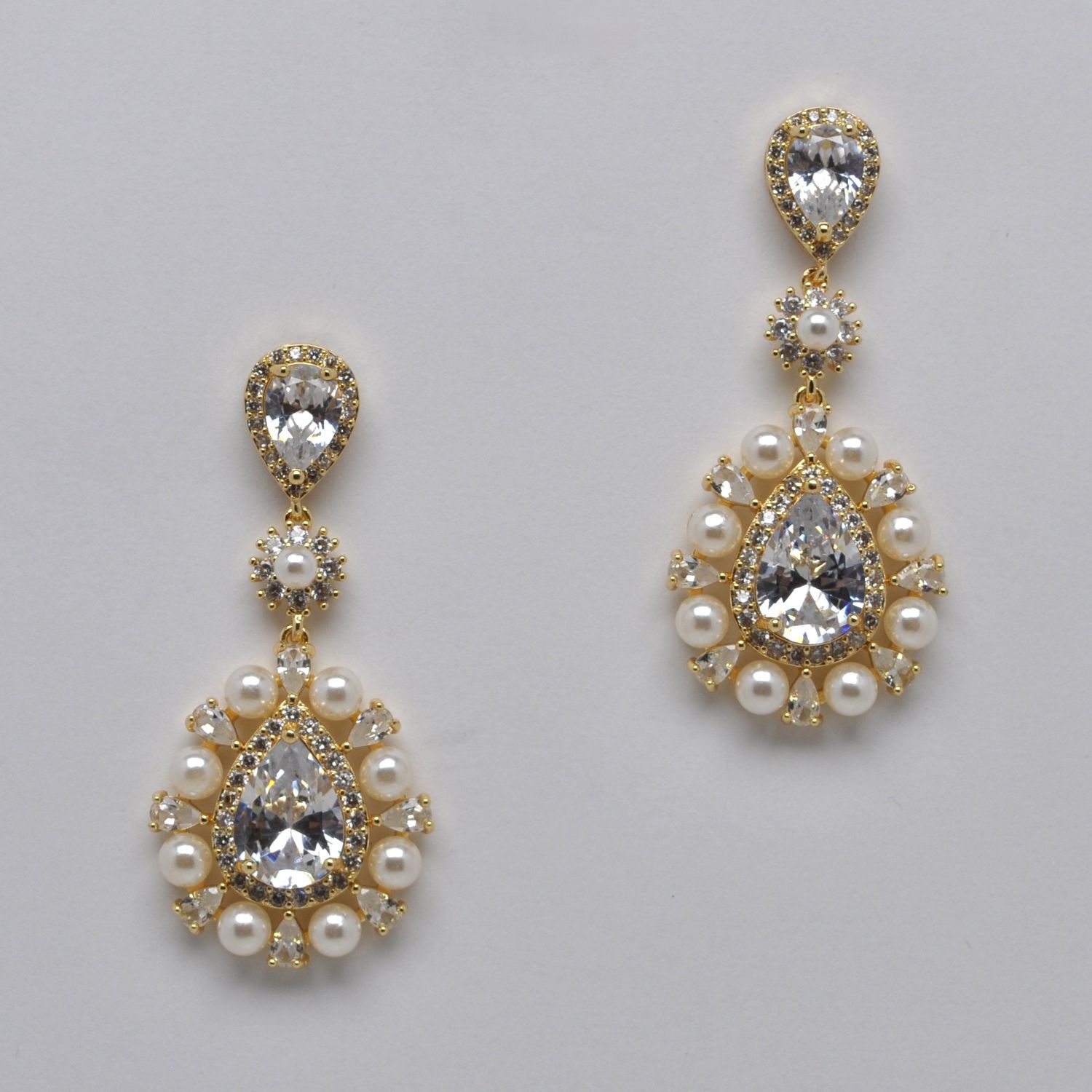 HJ001E40G CZ/PRL/G CLSTR TRDRP DNGLE CENTER MARQUISE EAR