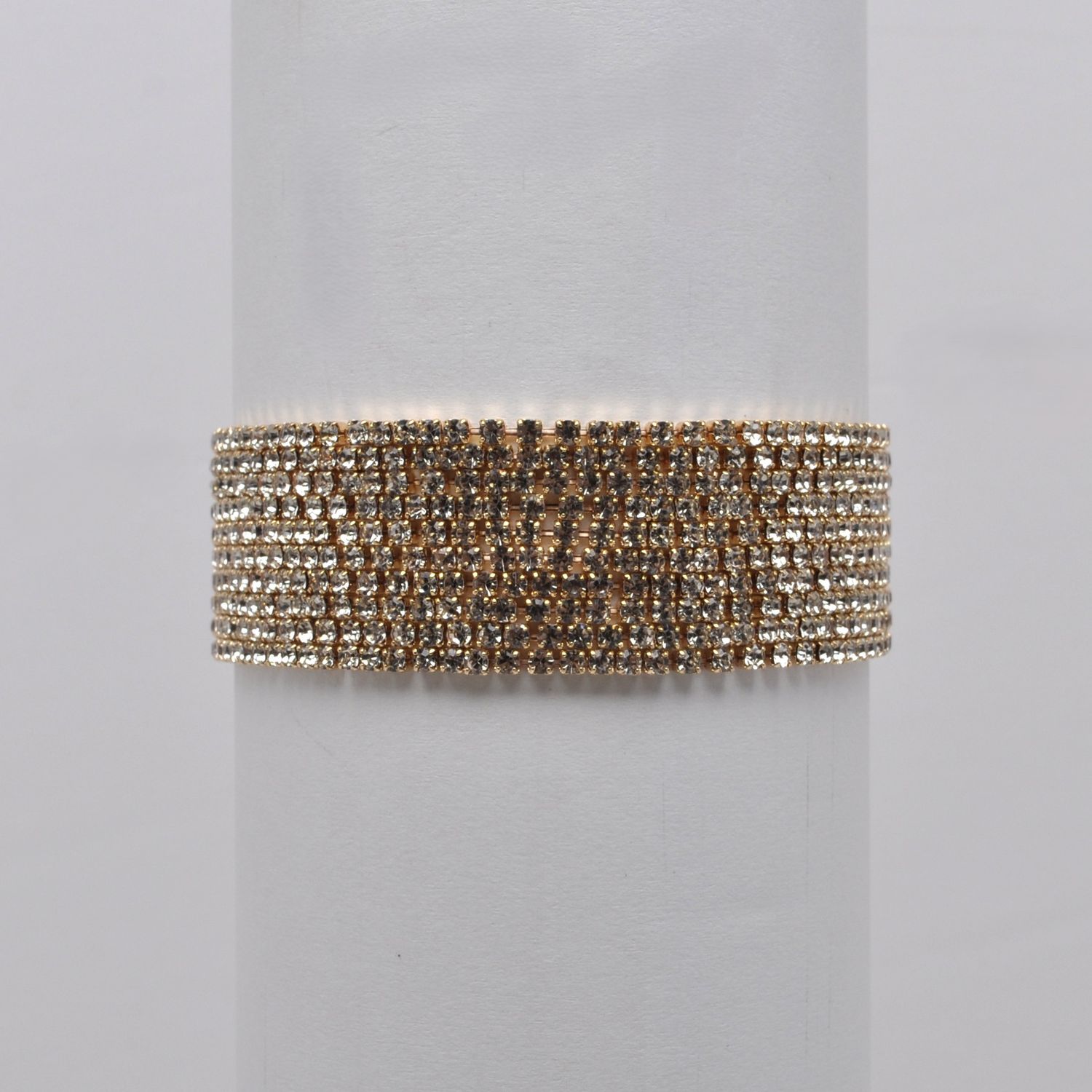 J84495B1G GOLD 10 STRAND THIN STRETCH BRAC