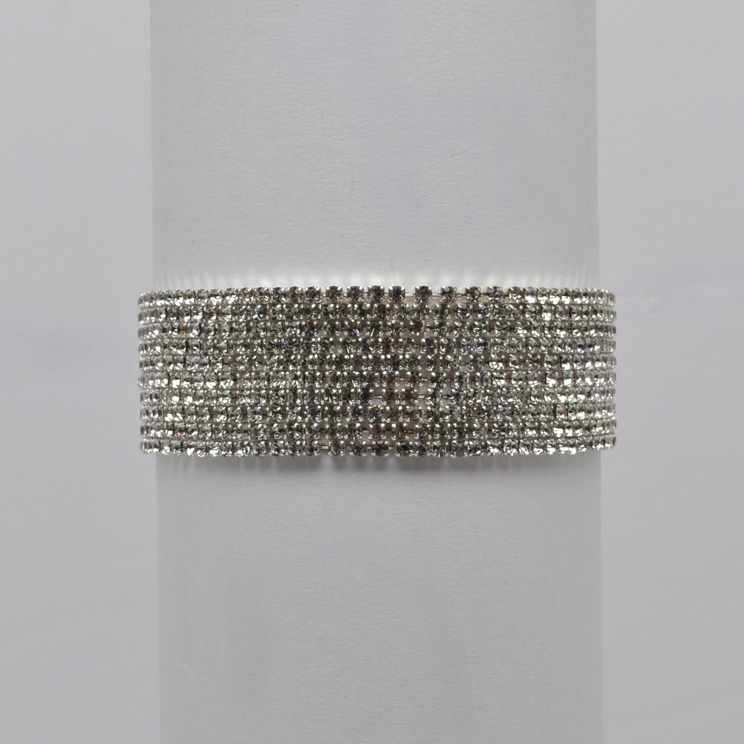 J84495B1S SIL 10 STRAND THIN STRETCH BRAC