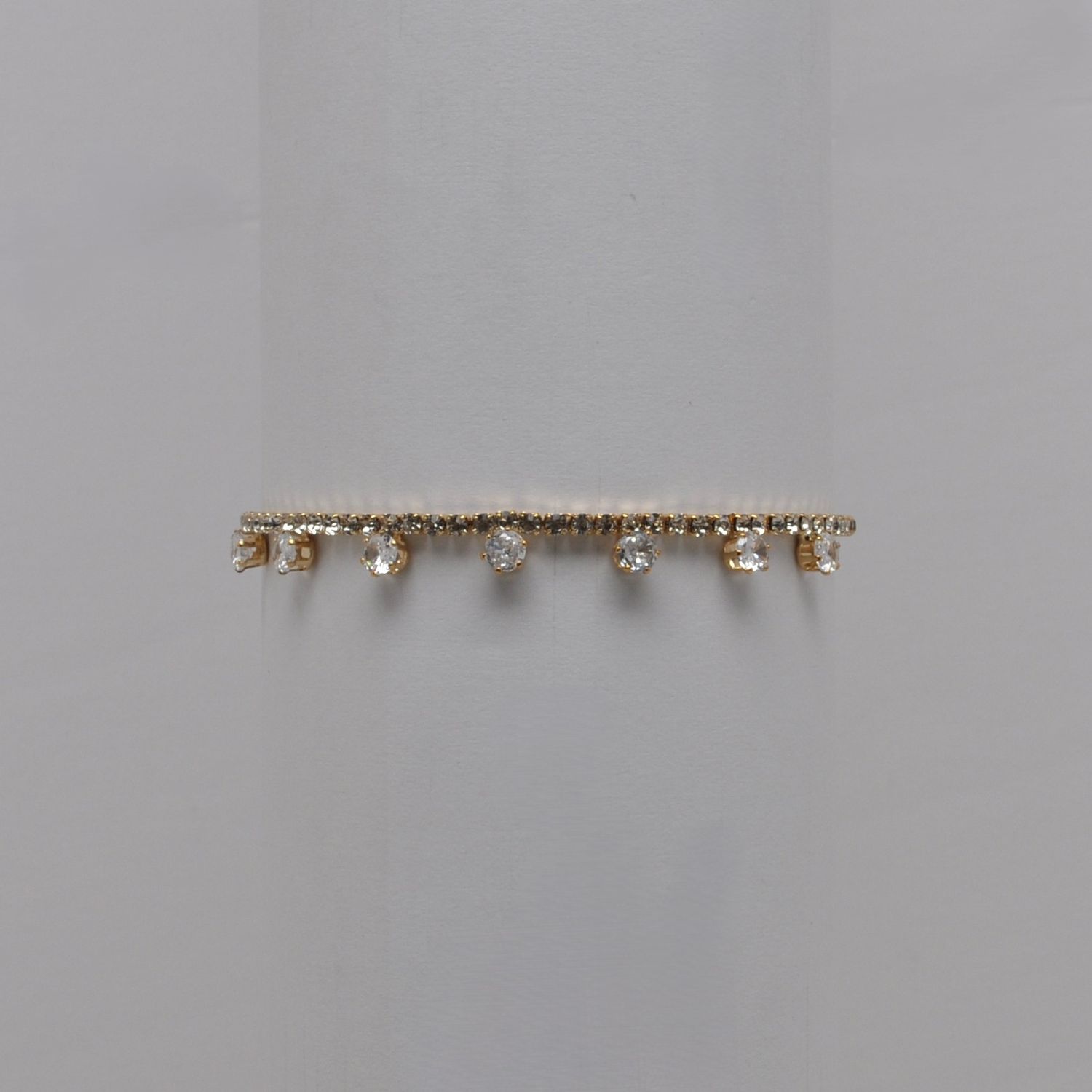 J84636B1G CZ CRY/GLD RHINESTONE ROUND SLIDE BRACELET