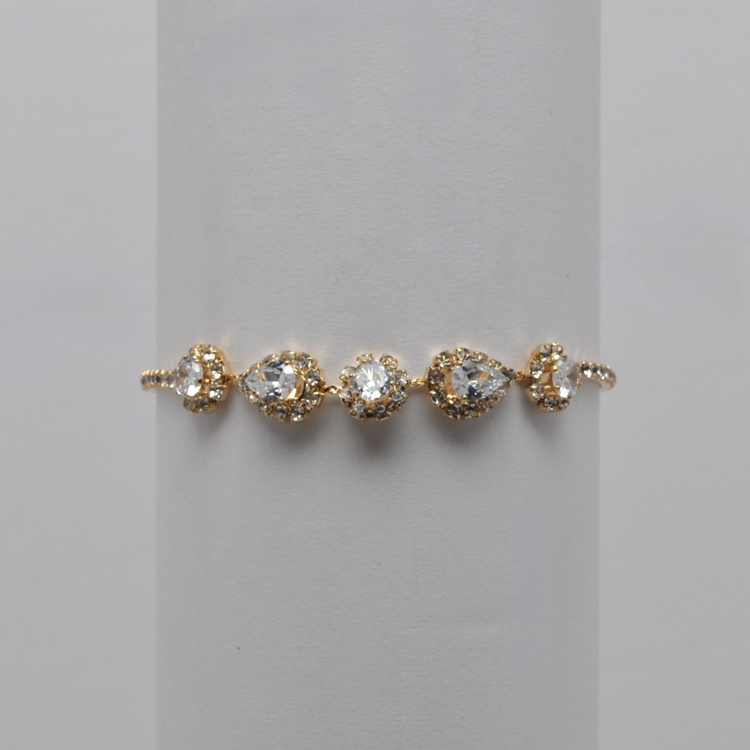 J84639B1G CZ CRY/GLD RHINESTONE TEARDROP SLIDE BRACELET