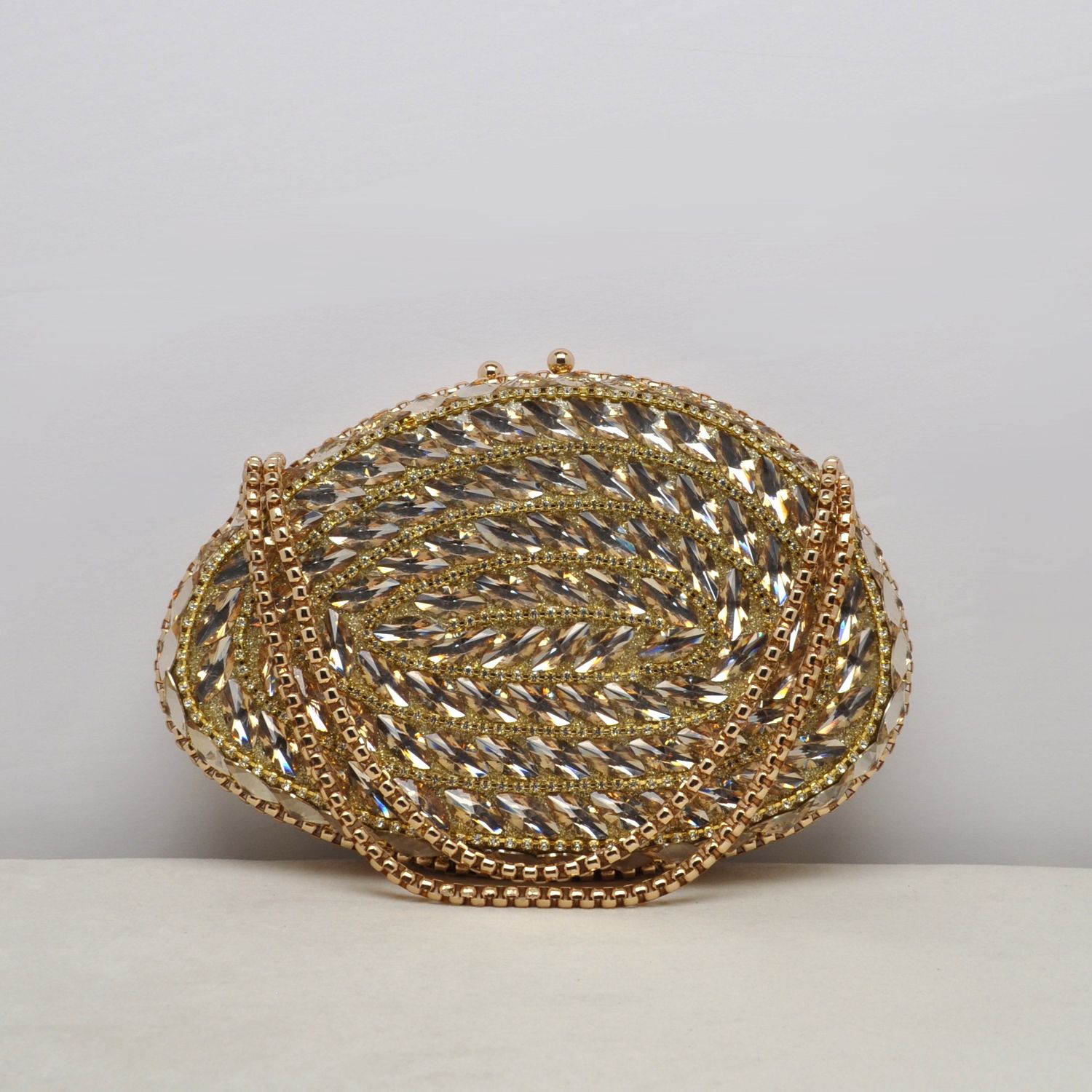 HF6025C4G GLD OVAL ALL OVER MRQUISE CRYSTAL PURS