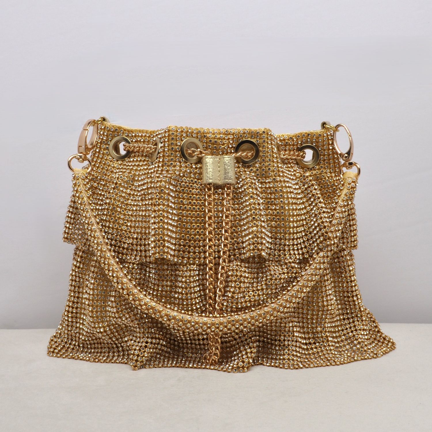 HF2602CG GOLD DRWSTG BUCKT  W' RUFFLE BTTM PURS