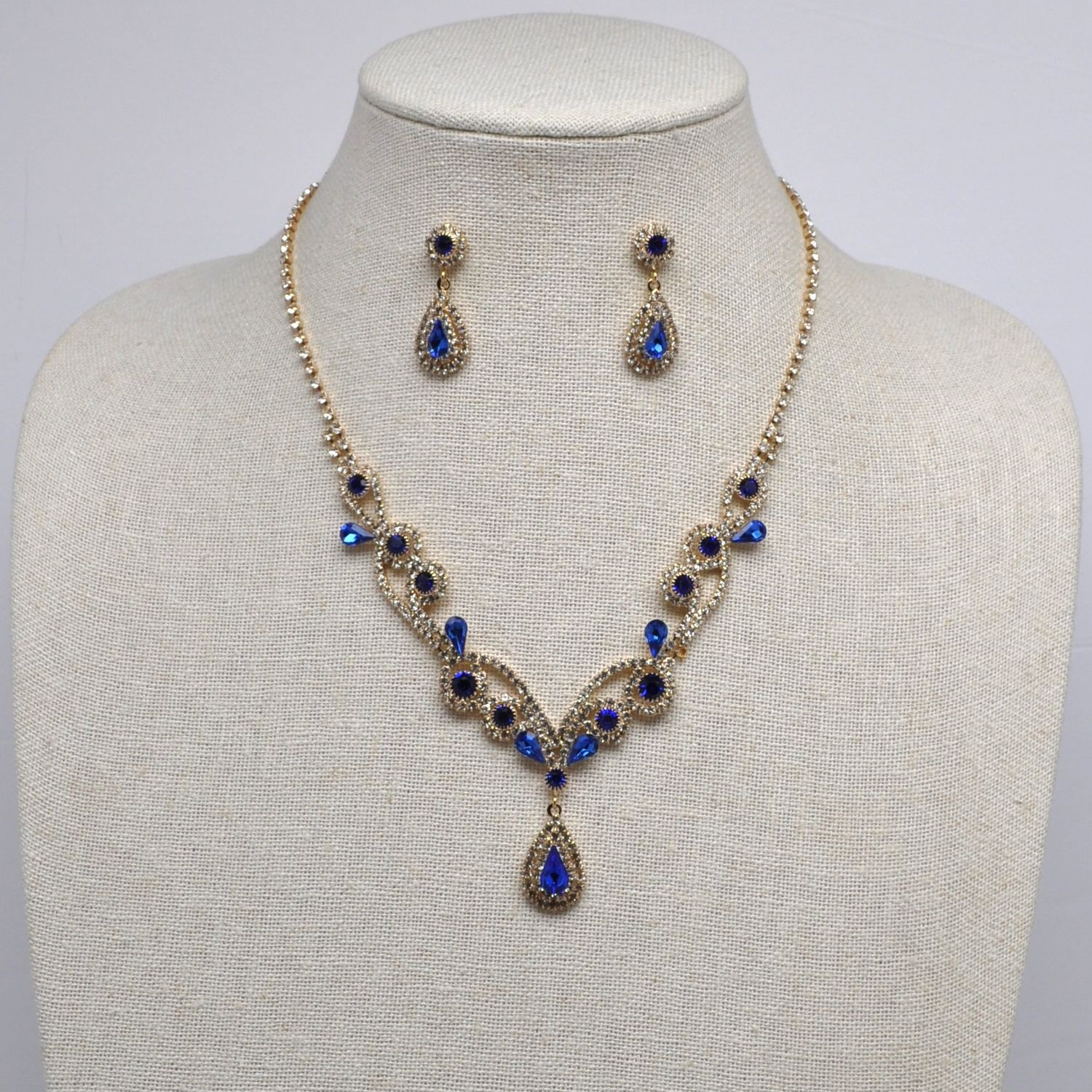 J48613S12G SAPPH/GLD Y DROP SWIRL FLWR NECK SET