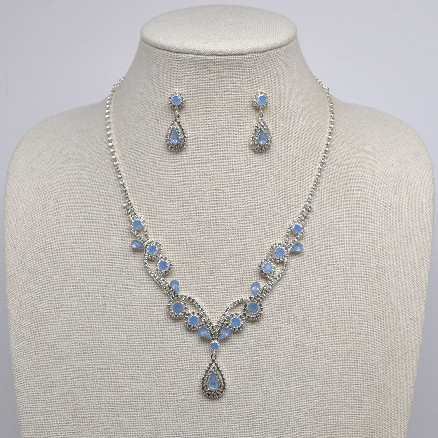 J48613S87S BL-OPAL/SIL Y DROP SWIRL FLWR NECK SET