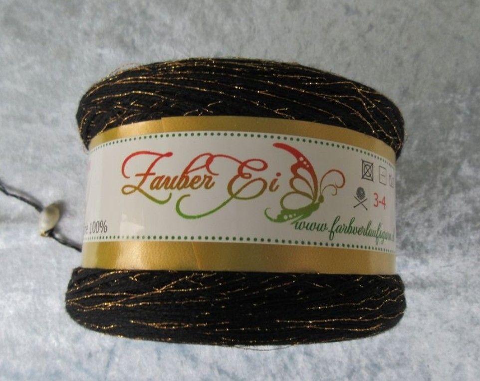 Merino Wolle &quot; Zauber Ei &quot;Schwarz mit Gold