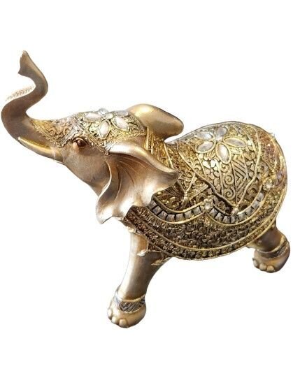 Figura de elefante con trompa hacia arriba y piedras. Elefante de la buena suerte.