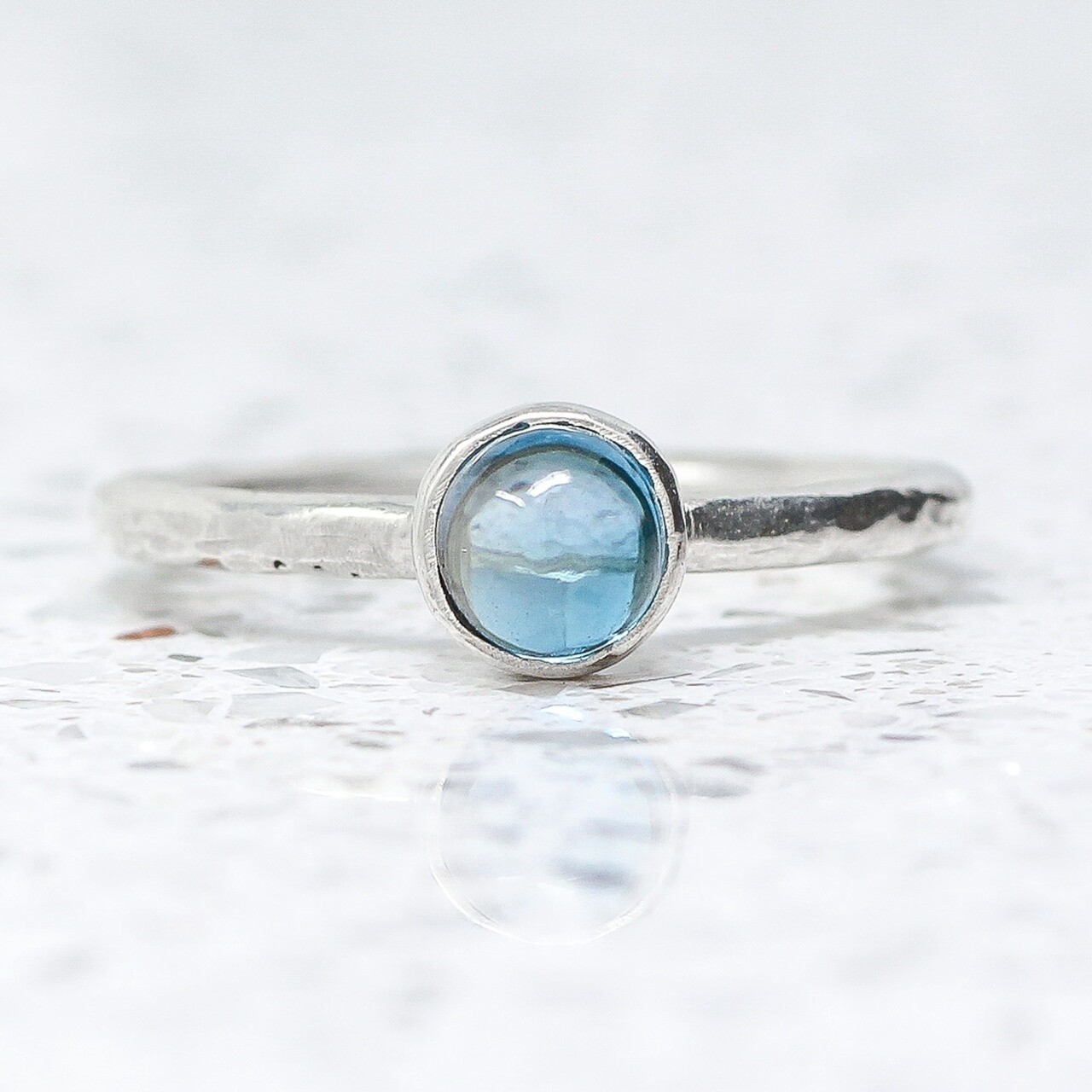 Beaten Silver Ring With London Blue Topaz By Fi Mehra