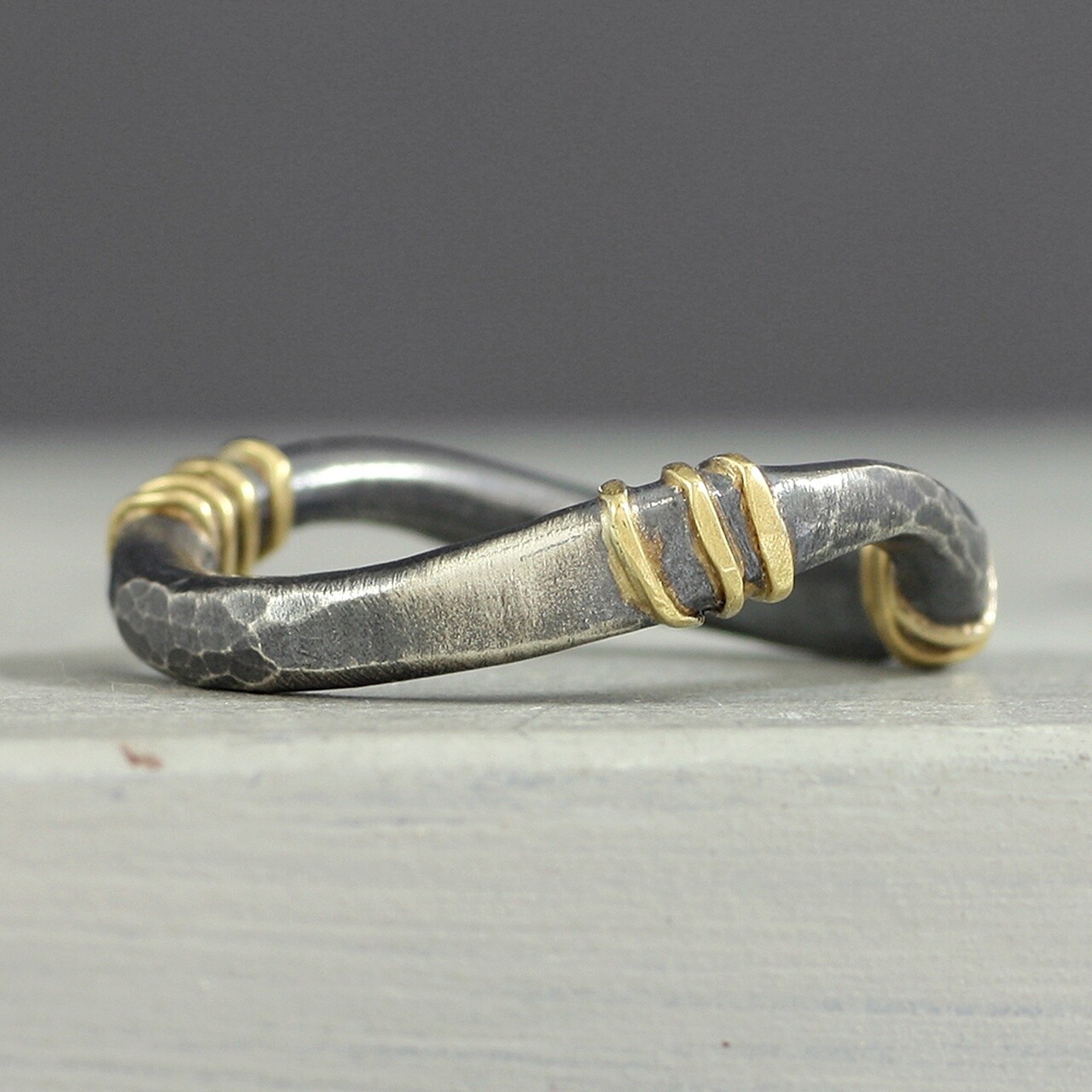 oxidised ring with gold wrap - medium weight - by adele taylor