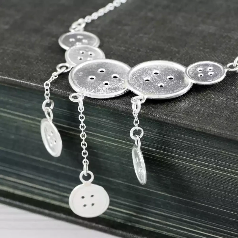 Buttons Landscape Silver Pendant With Three Drops by Fi Mehra