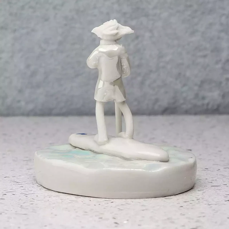 Ceramic Paddleborder Miniature Sculpture by Andrew Bull