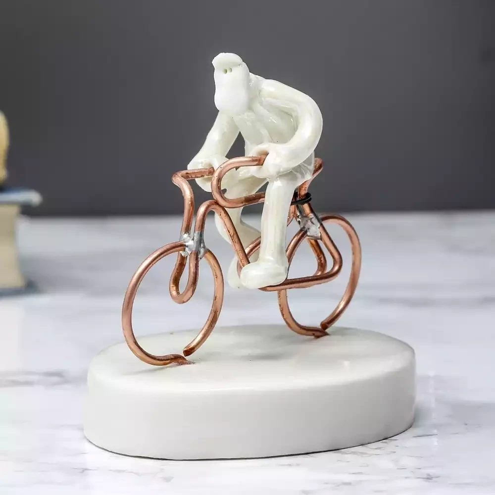 Ceramic Man On Pushbike Miniature Sculpture by Andrew Bull