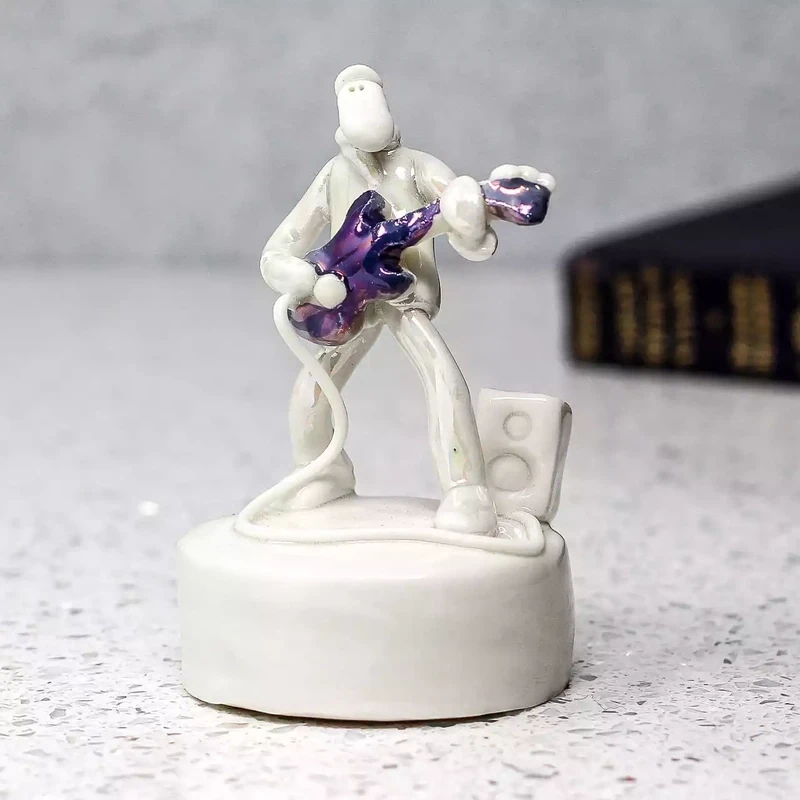 Ceramic Man Playing Guitar Miniature Sculpture by Andrew Bull