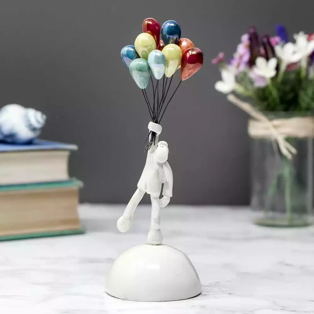 Ceramic Man With Balloons Miniature Sculpture by Andrew Bull
