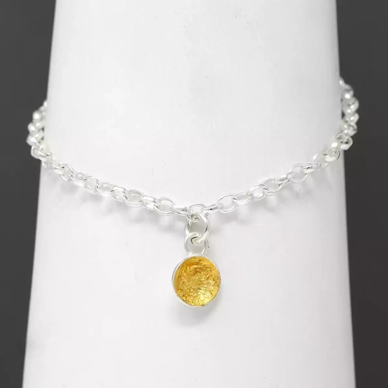 Concave Silver Disc Gold Leaf Charm on Bracelet by Fi Mehra