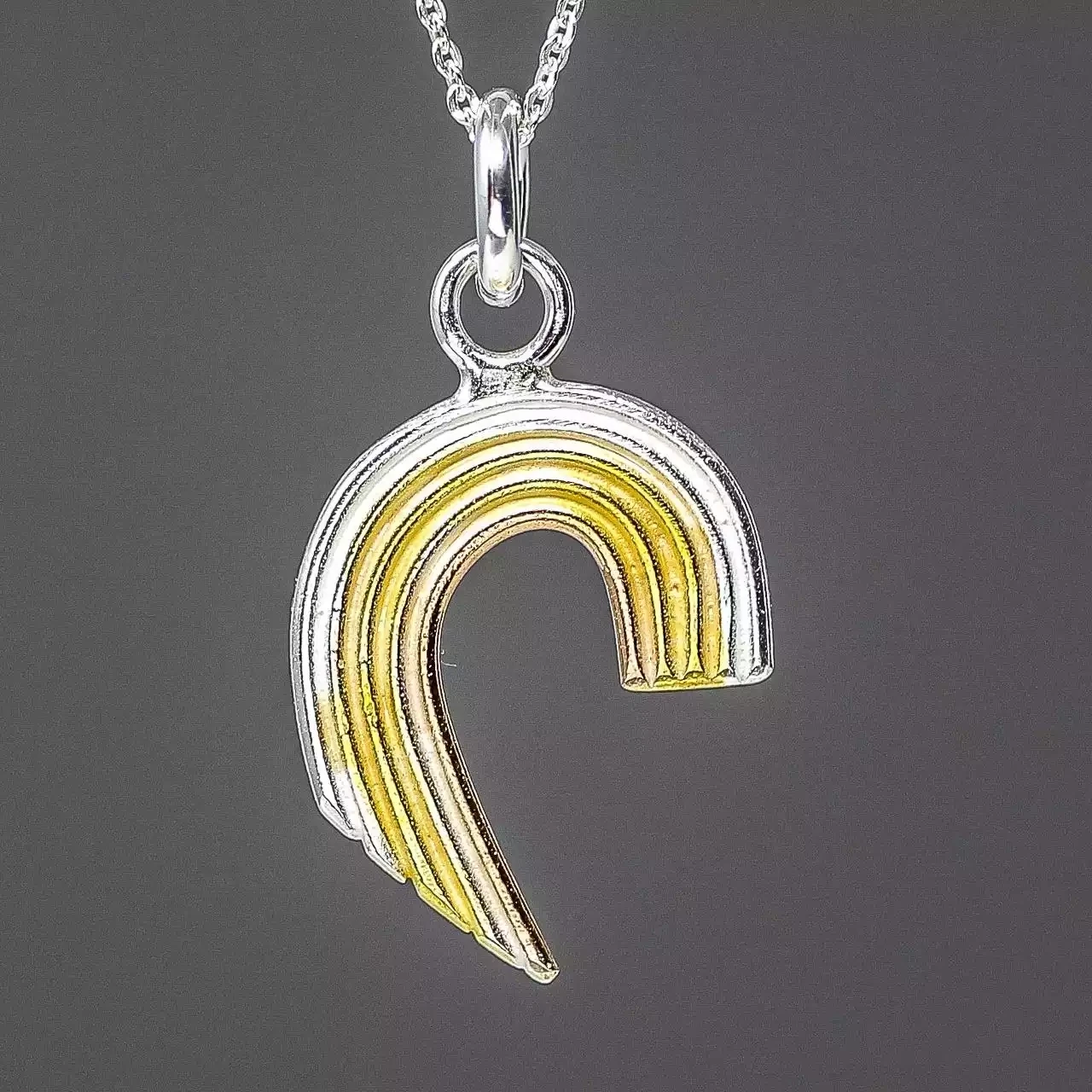 Curling Rainbow silver and gold plated pendant - large by Fi Mehra
