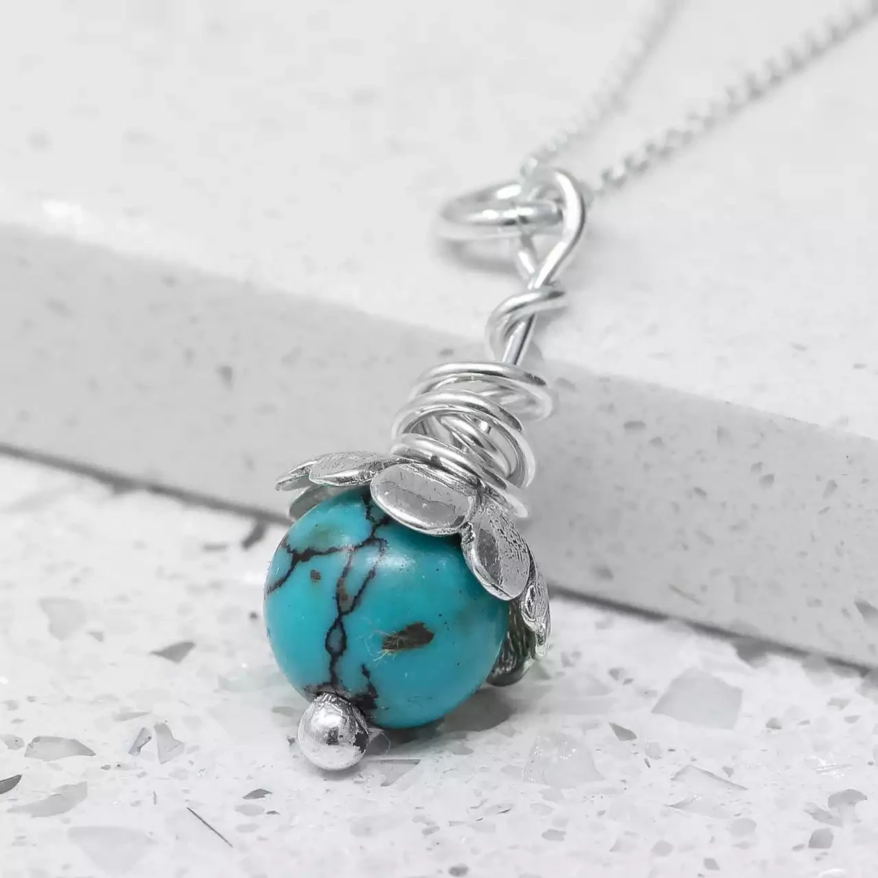 Dangly Silver Flower Pendant With Turquoise by Fi Mehra