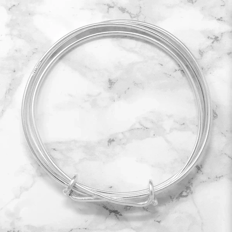 Expandable 2mm Triple Wound Silver Bangle by Fi Mehra