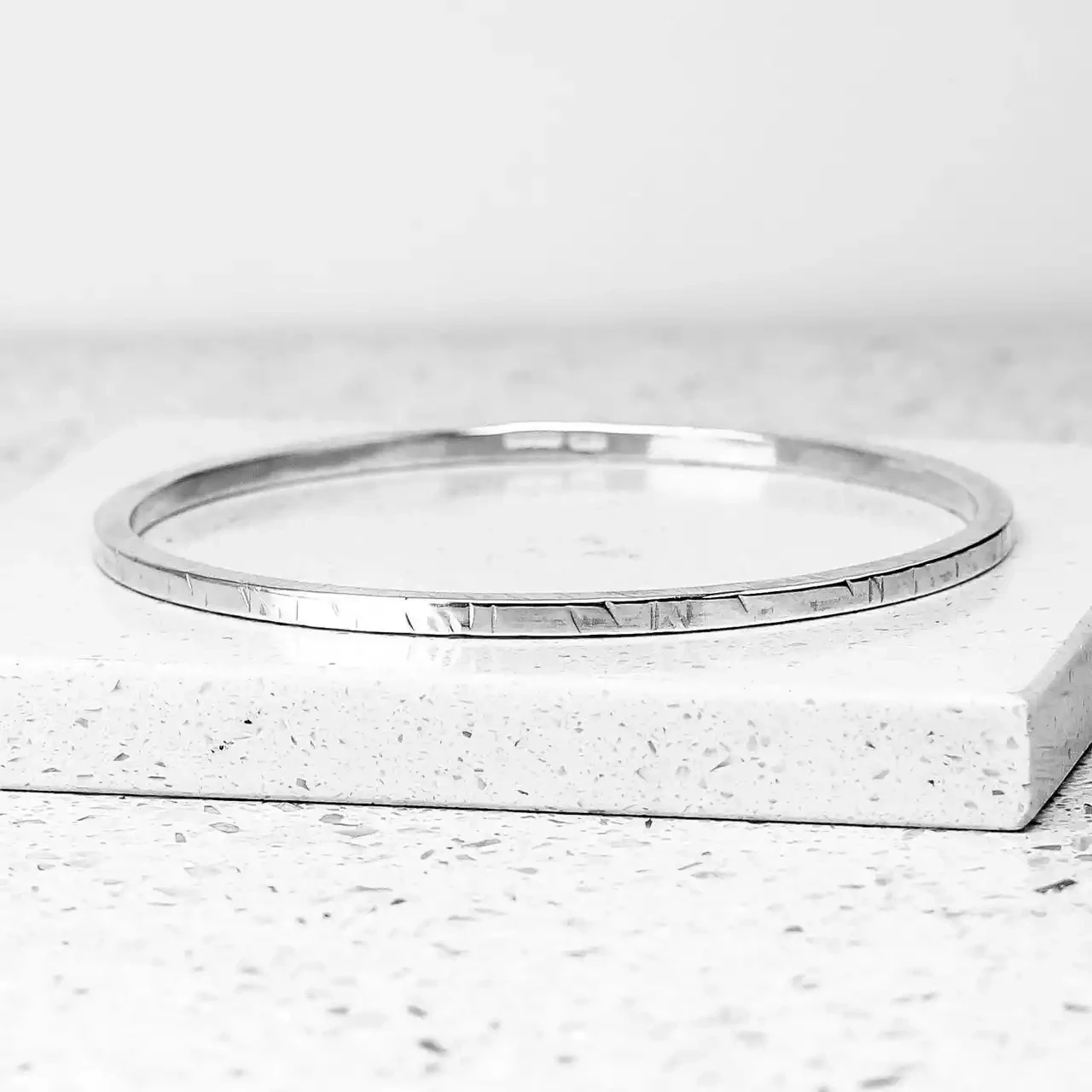 Etched Square Polished Silver Bangle by Fi Mehra