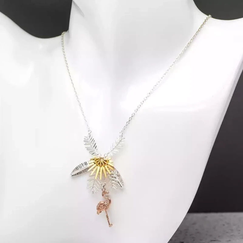 Flamingo and Palm Leaf Silver and Rose Gold Plate Necklace by Amanda Coleman