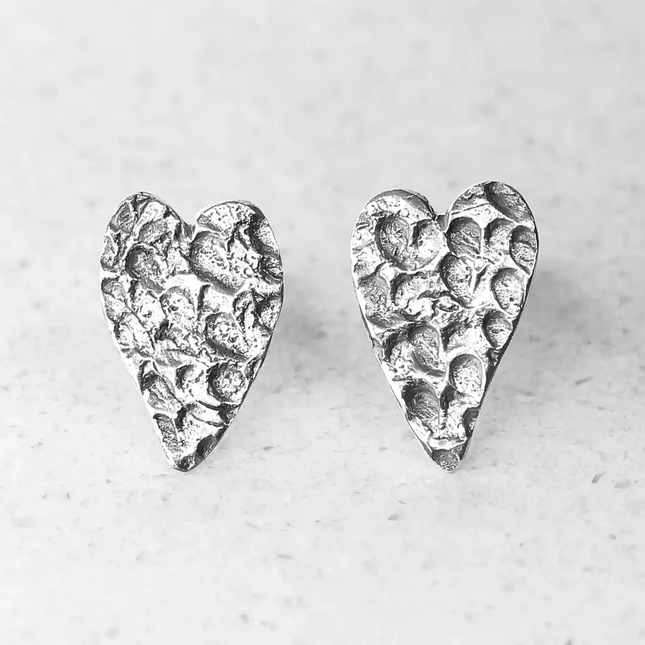 Heart-stamped Oxidised Silver Heart Studs by Fi Mehra