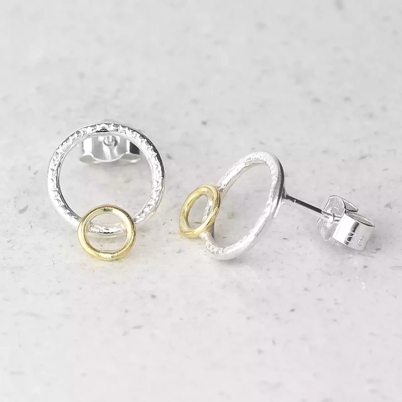 loop silver and gold stud earrings by adele taylor
