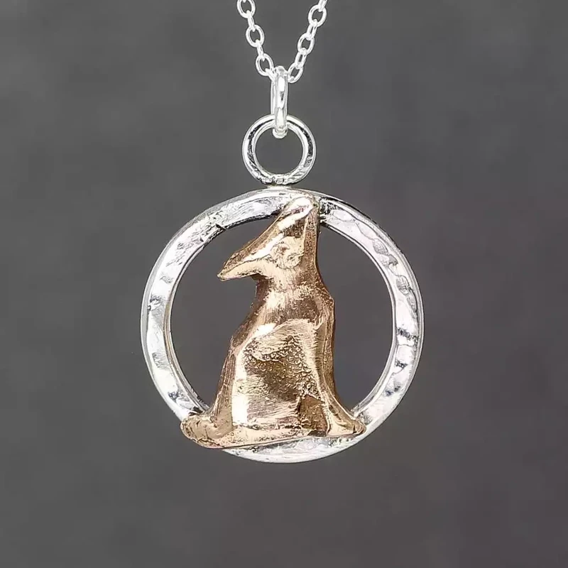Moongazing Hare in Circle Silver and Bronze Pendant by Xuella Arnold