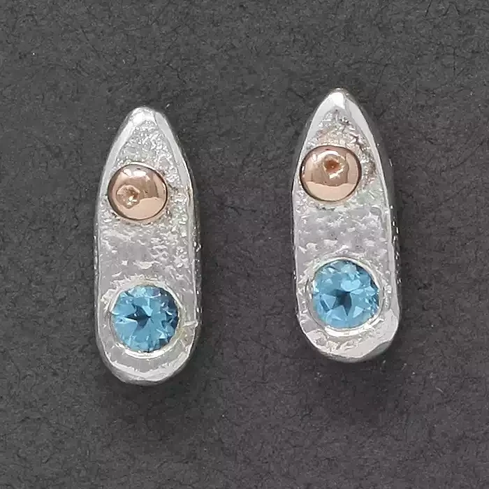Obelisk Silver and Rose Gold Nugget Stud Earrings - Sky Blue Topaz by Fi Mehra