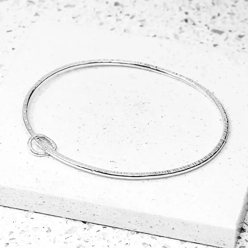 Outlines Oval with Pear Connection Bangle - Silver by Tara Kirkpatrick