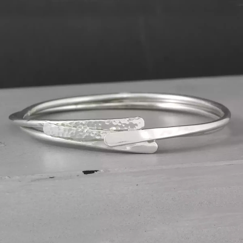 Petals Hammered Silver Bangle by Fiona Mackay