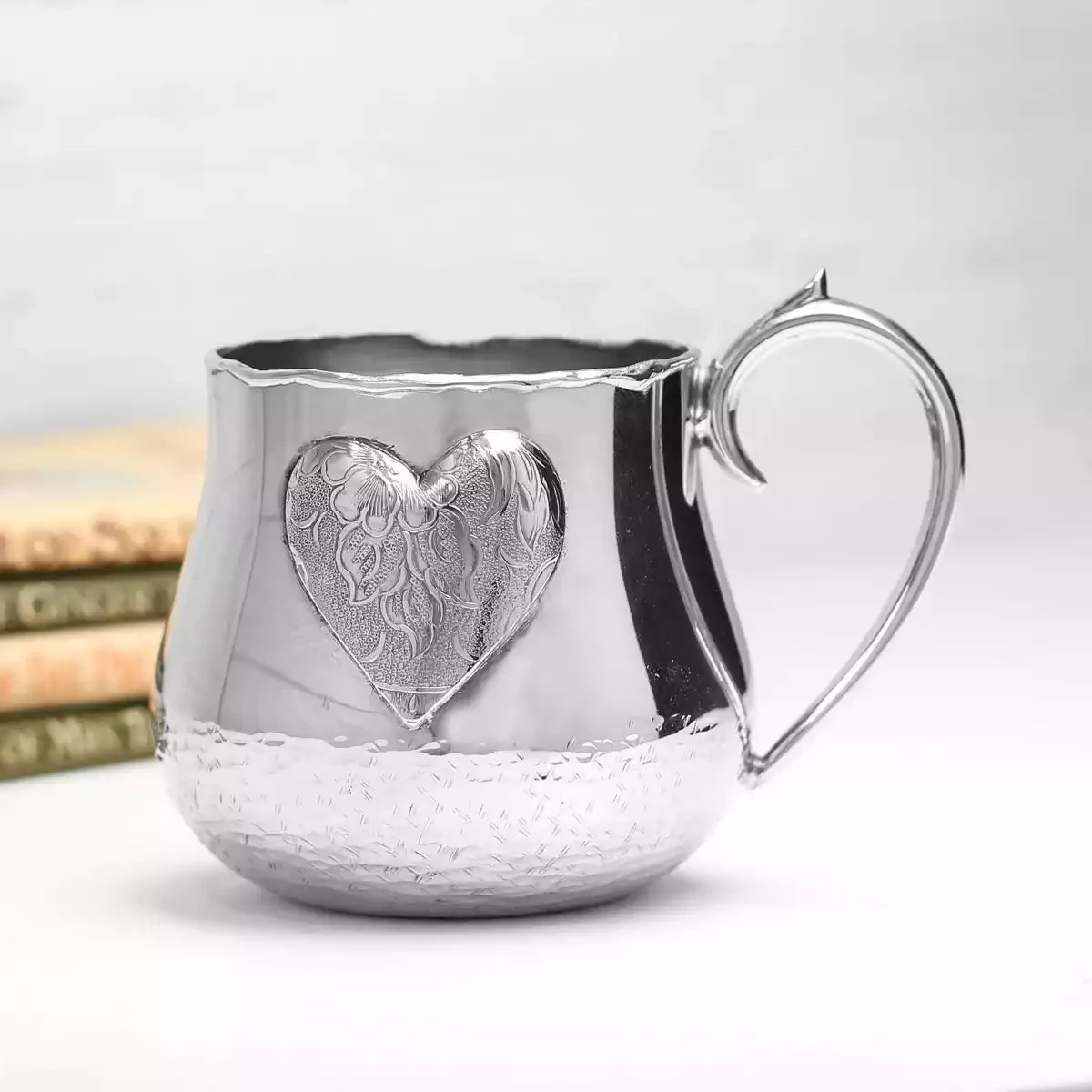 Pewter Cup With Embossed Heart Decoration by Jim Stringer