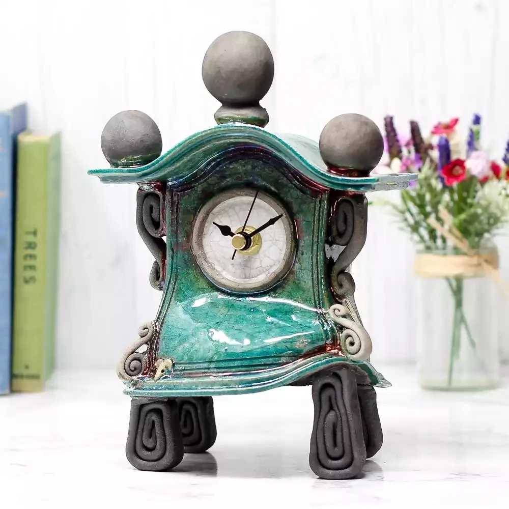 quirky ceramic mantel clock - small warped - turquoise by ian roberts