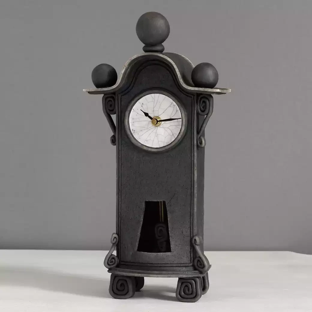 quirky ceramic mantel clock with pendulum - tall - charcoal by ian roberts TBBP