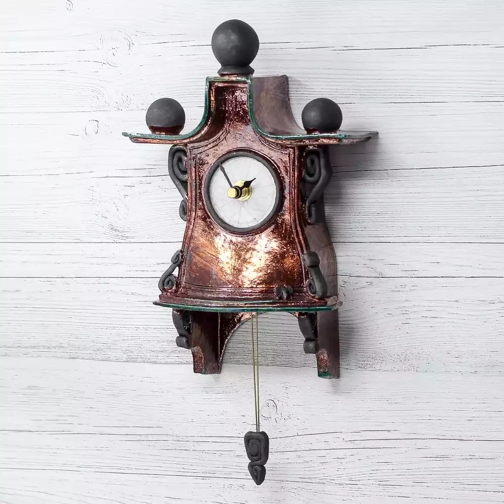 quirky ceramic pendulum wall clock - small - copper by ian roberts