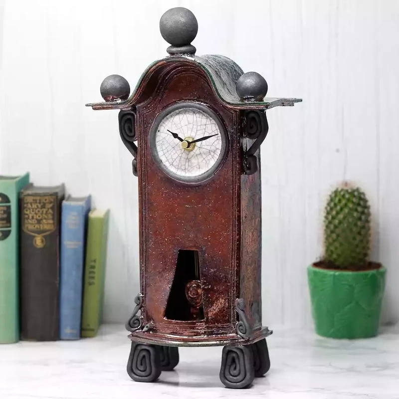 quirky ceramic mantel clock with pendulum - tall - copper by ian roberts TBCP