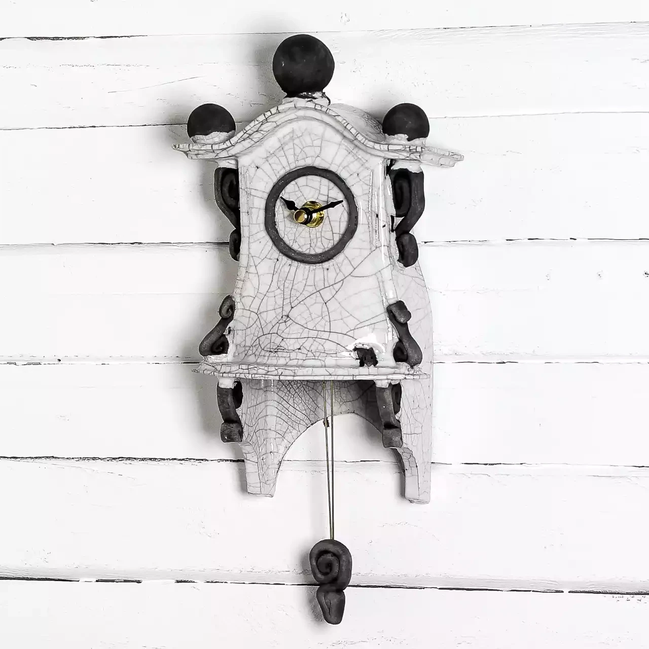 quirky ceramic pendulum wall clock - small - white by ian roberts