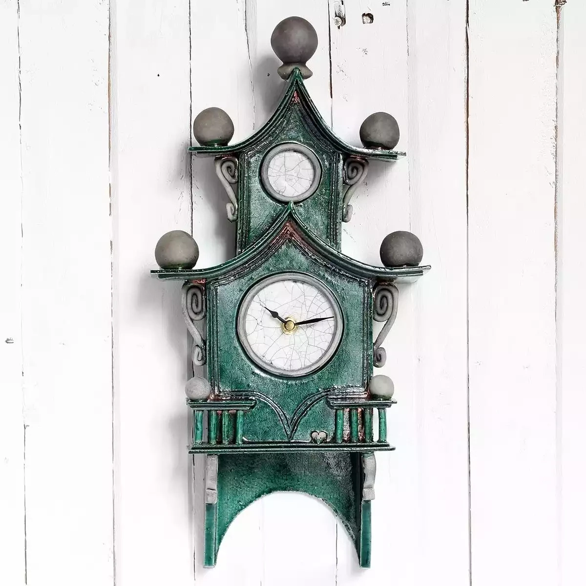 quirky ceramic two-tier pendulum wall clock - emerald green by ian roberts